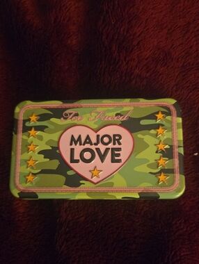 Too Faced Green Camo Wall Tin with Pink Heart and Gold Stars